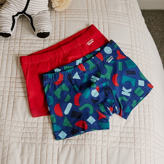 Two pairs of boys Jockey boxers one with stripes and onw in blue colour