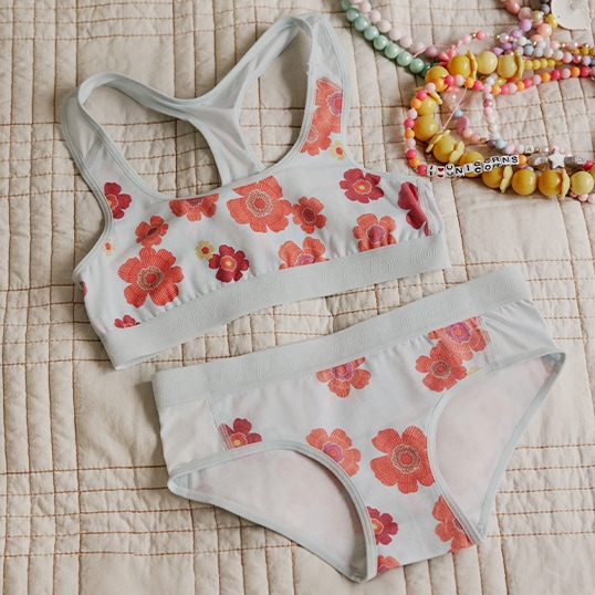 2 pairs of girls underwear and tank tops with 3 flowers