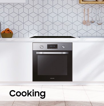 Samsung built in oven with cooktop in a white kitchen