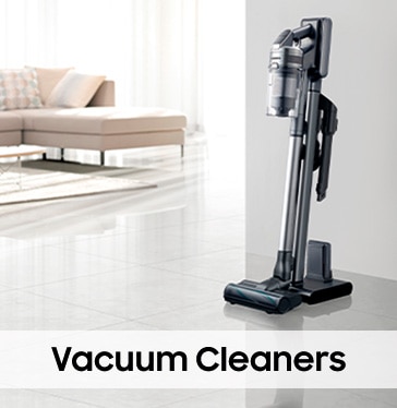 Samsung Upright Vacuum cleaner on tiles in a room in front of a counch